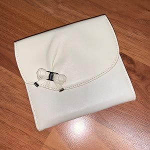 Authentic Salvatore Ferragamo Leather Wallet with Bow Detail